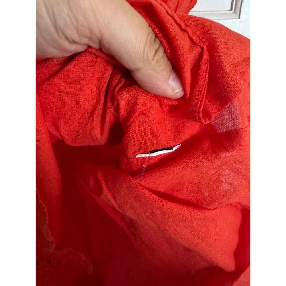Kate Spade orange ruffle‎ sleeve eyelet top size medium